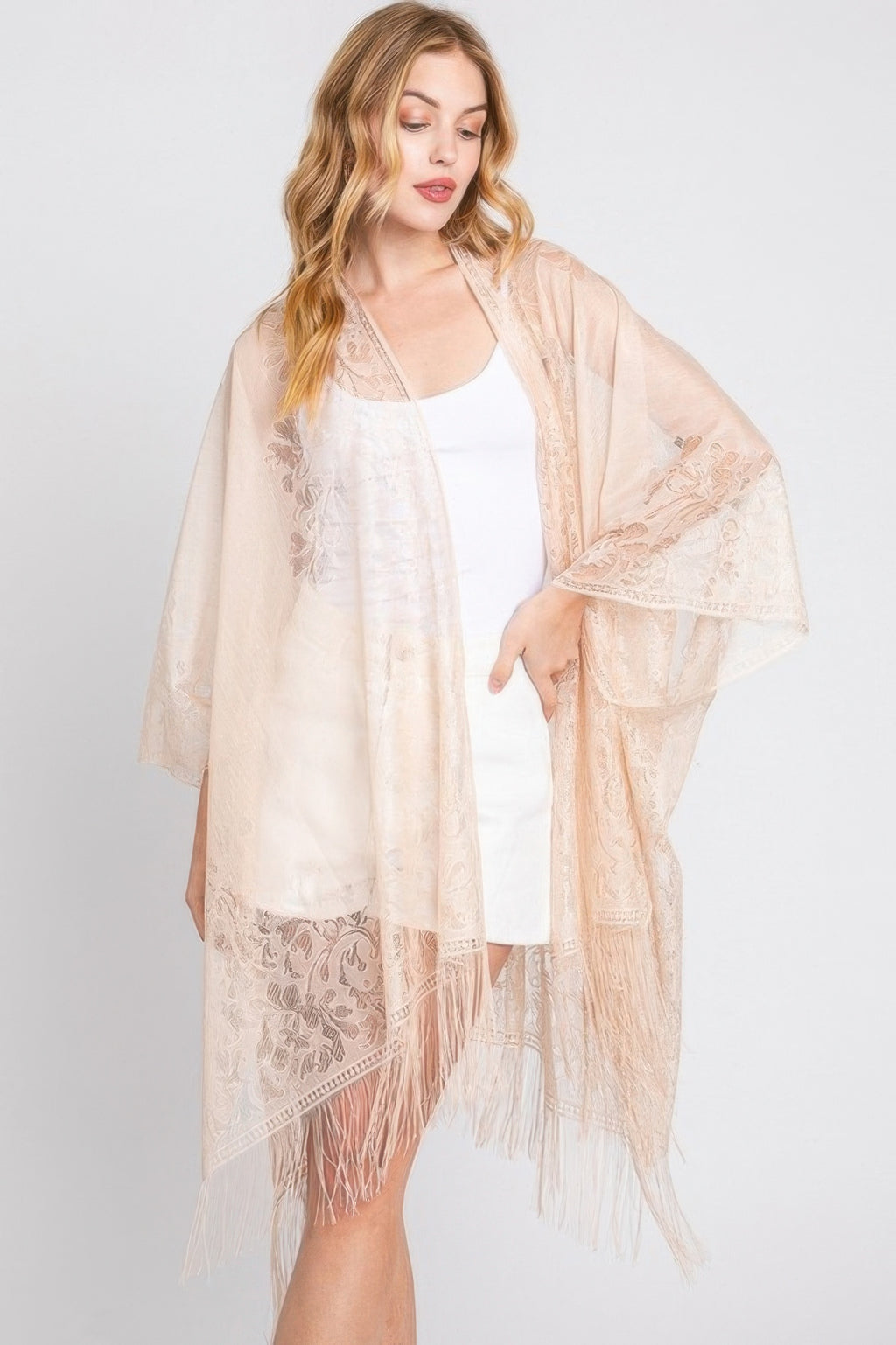 Floral lace kimono in beige with fringed tassels and open front