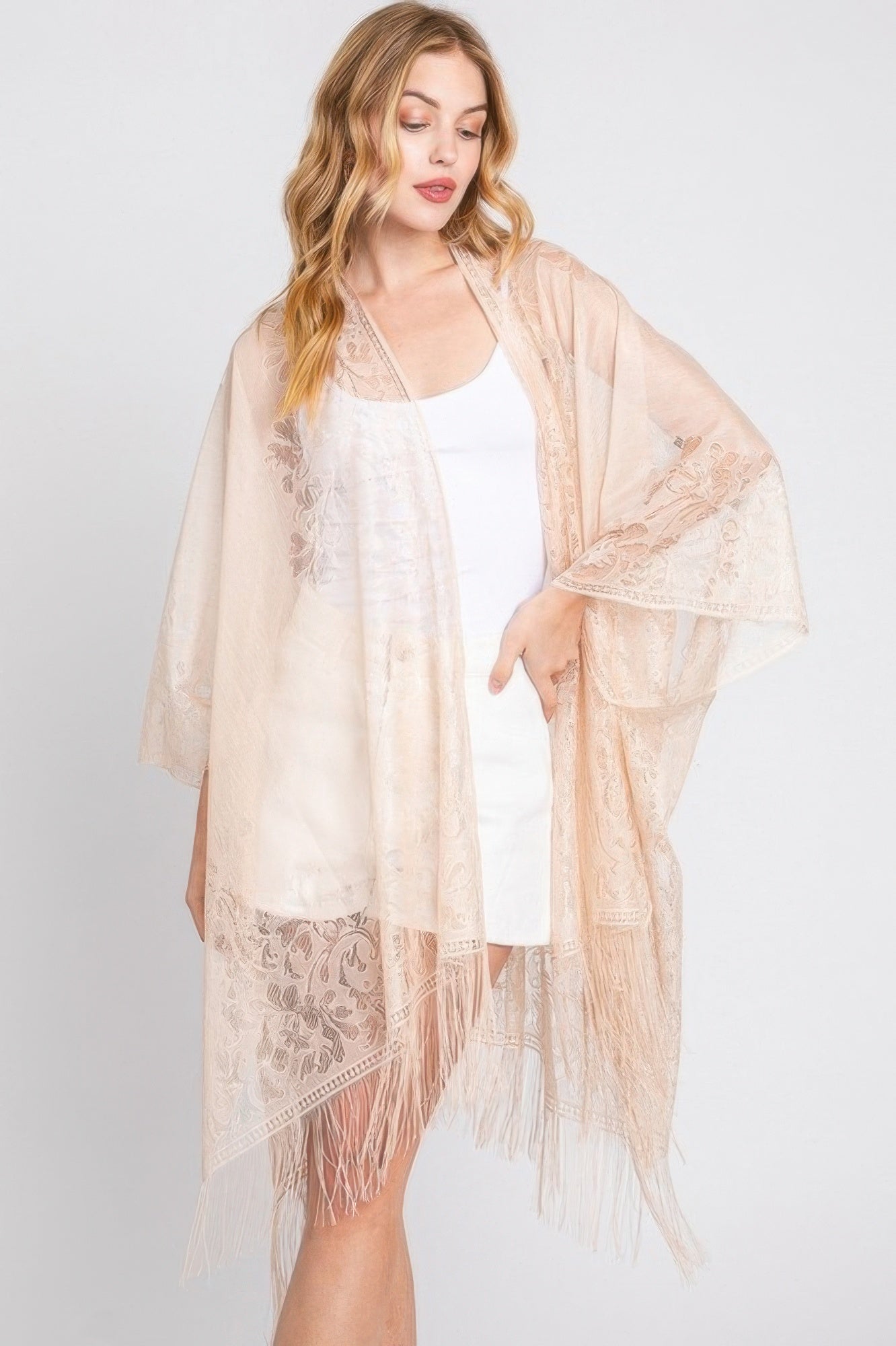 Floral lace kimono in beige with fringed tassels and open front
