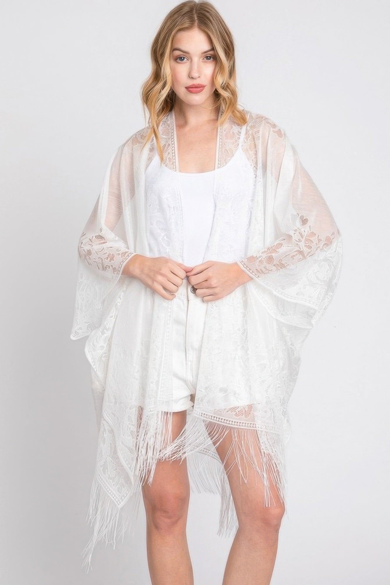 White floral lace kimono with fringe tassel edges and open front
