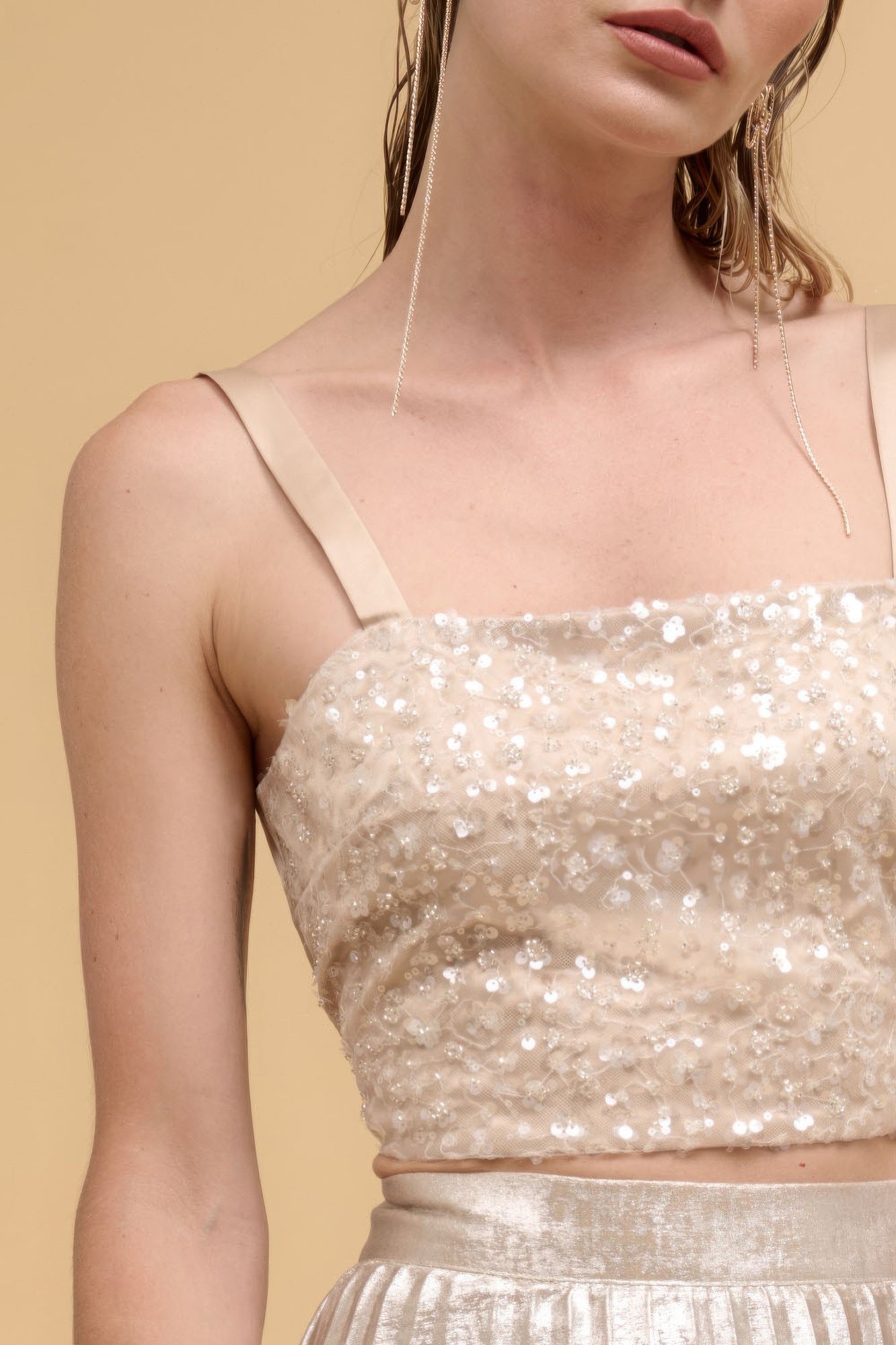 Close-up of champagne floral sequin straight-neck crop top front with thin straps