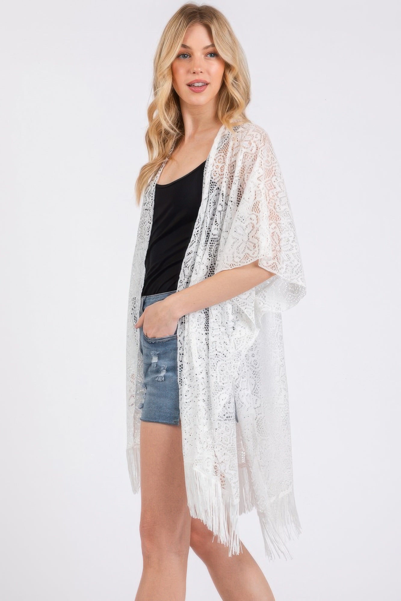 White crochet lace cover up with draped open front, floral texture and tassel ends