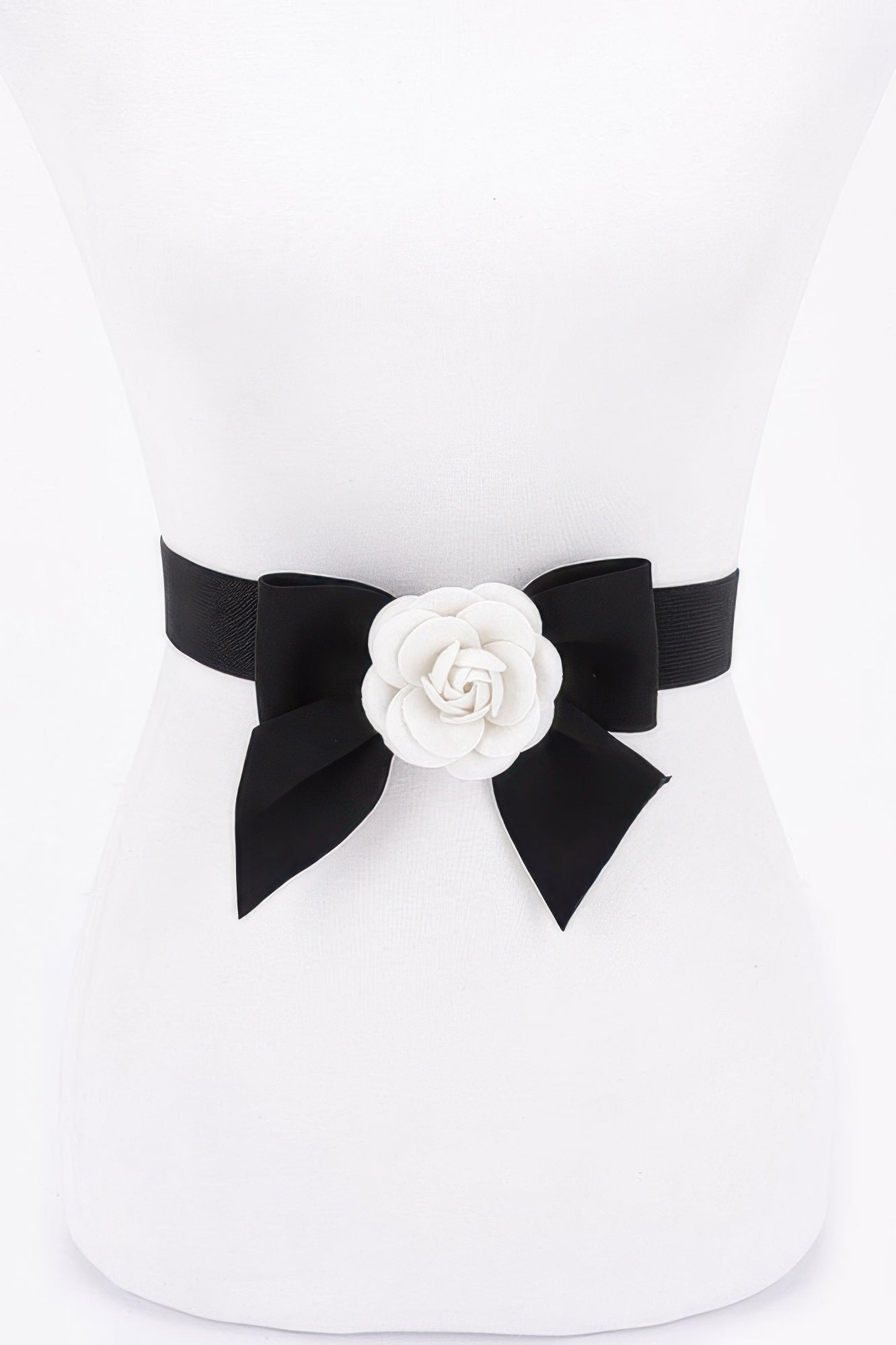 Black elastic ribbon belt with white flower rosette detail at center