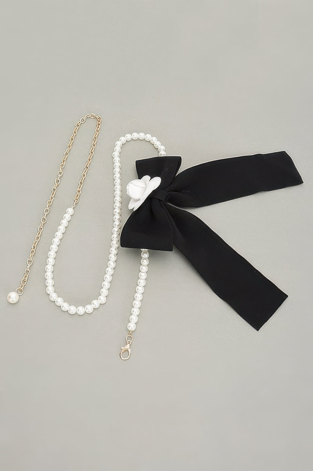Belt set with faux pearl strands, black ribbon flower bow, gold and pearl chains