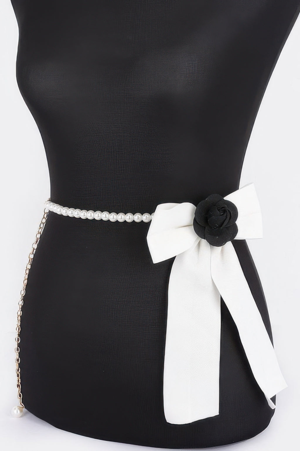 Faux pearl bead belt with long chain and black/white ribbon bow flower detail