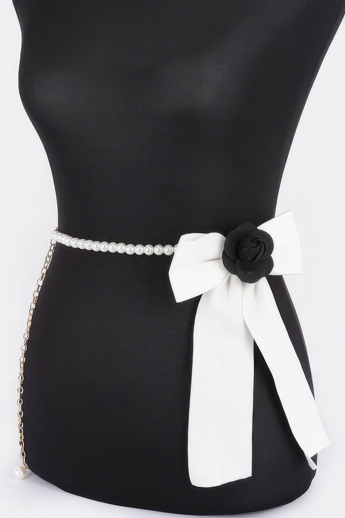 Faux pearl bead belt with long chain and black/white ribbon bow flower detail