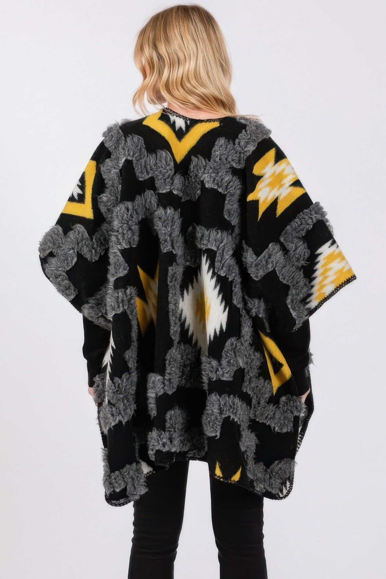 Black fuzzy kimono back view with Aztec pattern and loose poncho-style fit