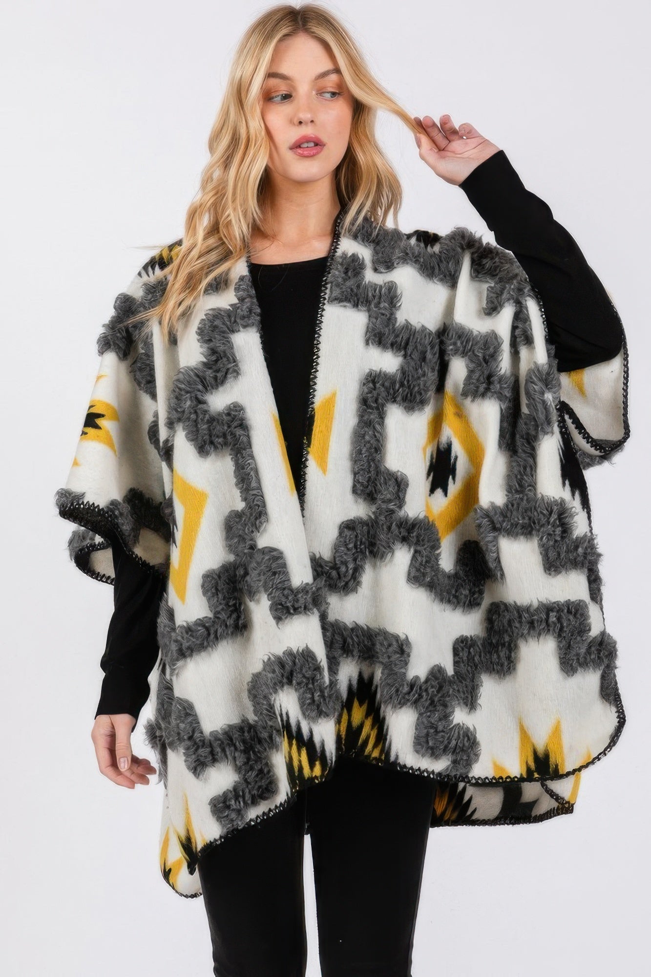 Ivory fuzzy kimono with Aztec pattern, open front and batwing sleeves