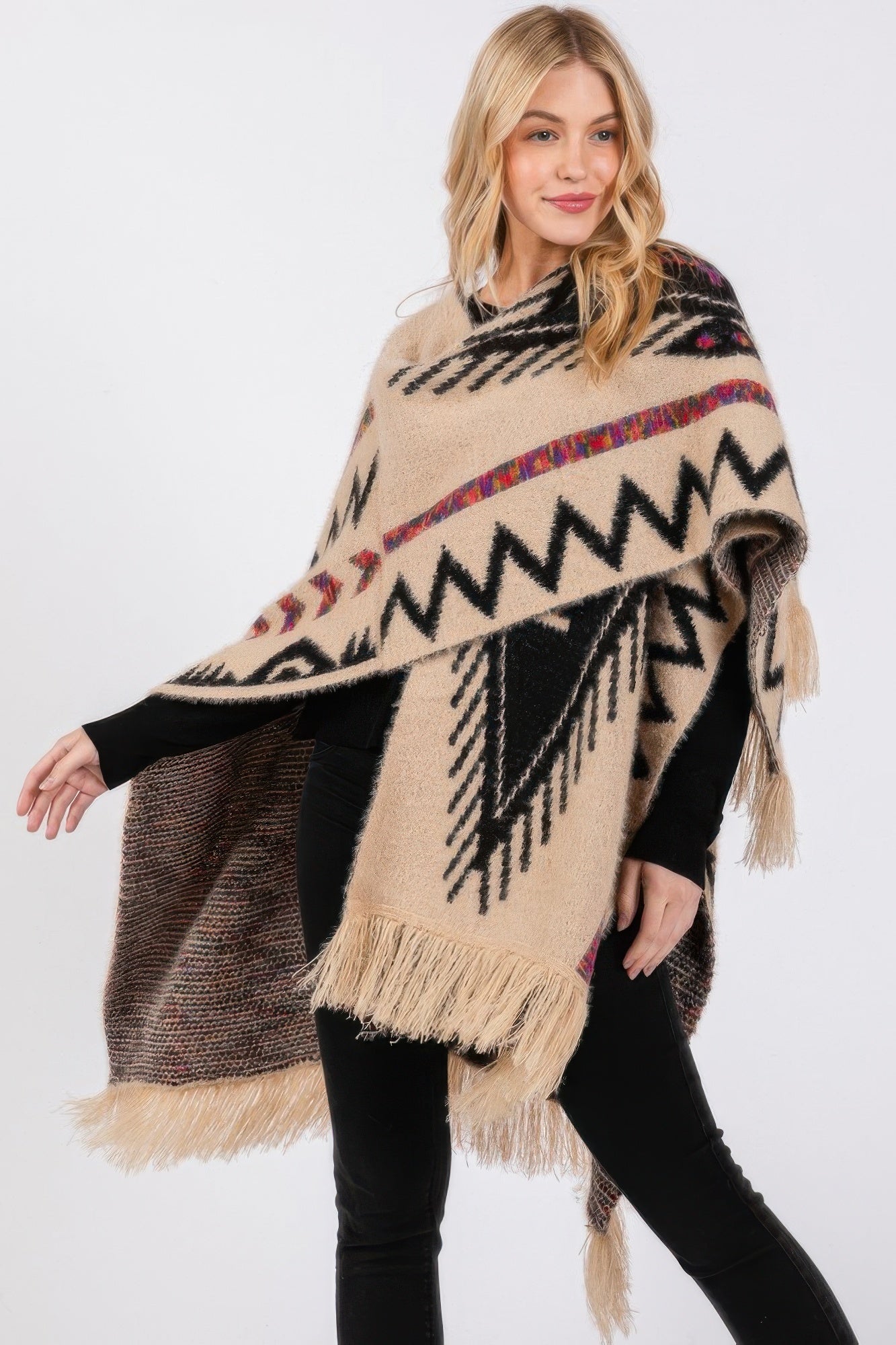 Fuzzy aztec patterned tassel knit ruana, ivory with black zigzags and fringe ends