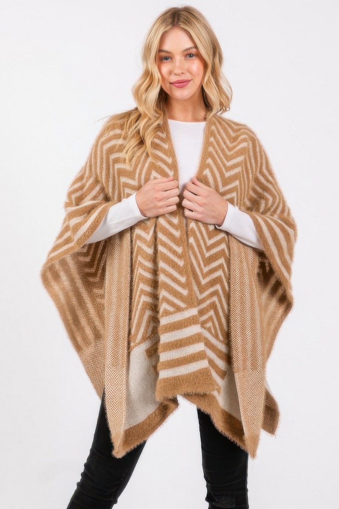 Fuzzy chevron ruana in taupe with white zigzag pattern and soft fringed edges
