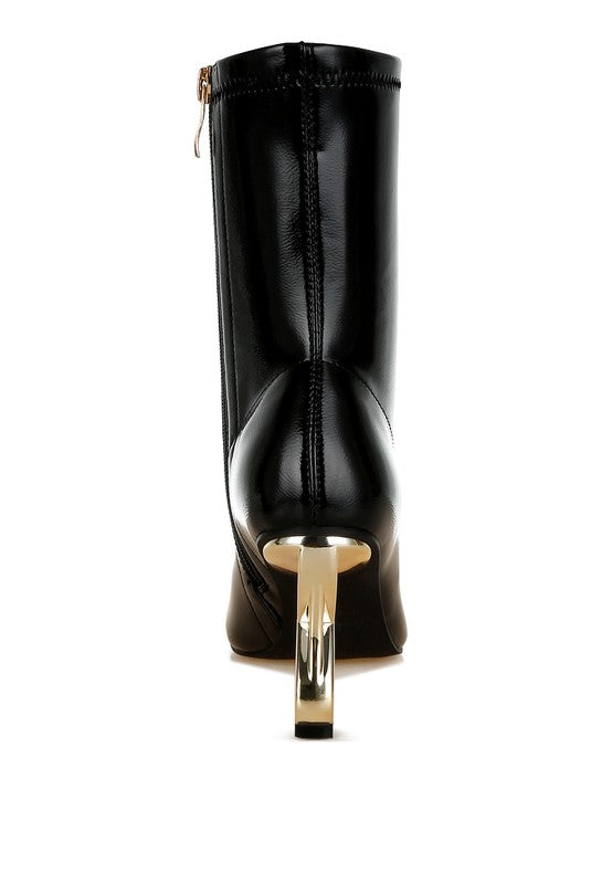 Black patent faux-leather boot, heel back view with gold geometric block heel