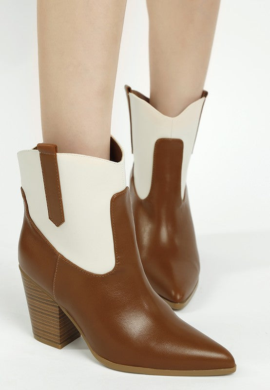 Tan two-tone cowboy boots with off-white side panels and medium block heel