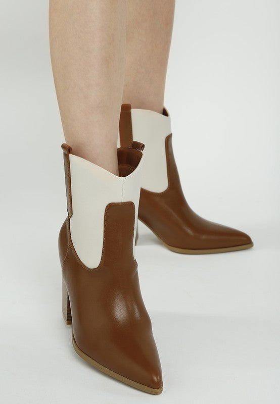 Two-tone cowboy boots in tan with off-white shafts and brown pull-on tabs
