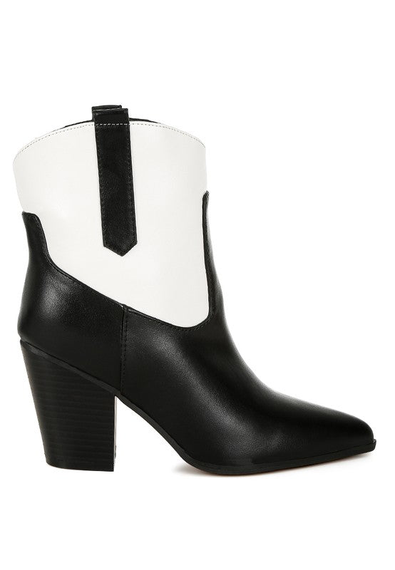 Black and off-white cowboy boots with pointed toe, low heel, and side slit detail