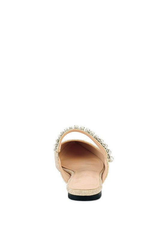 Beige embellished mules heel view with pearl bead trim and open topline