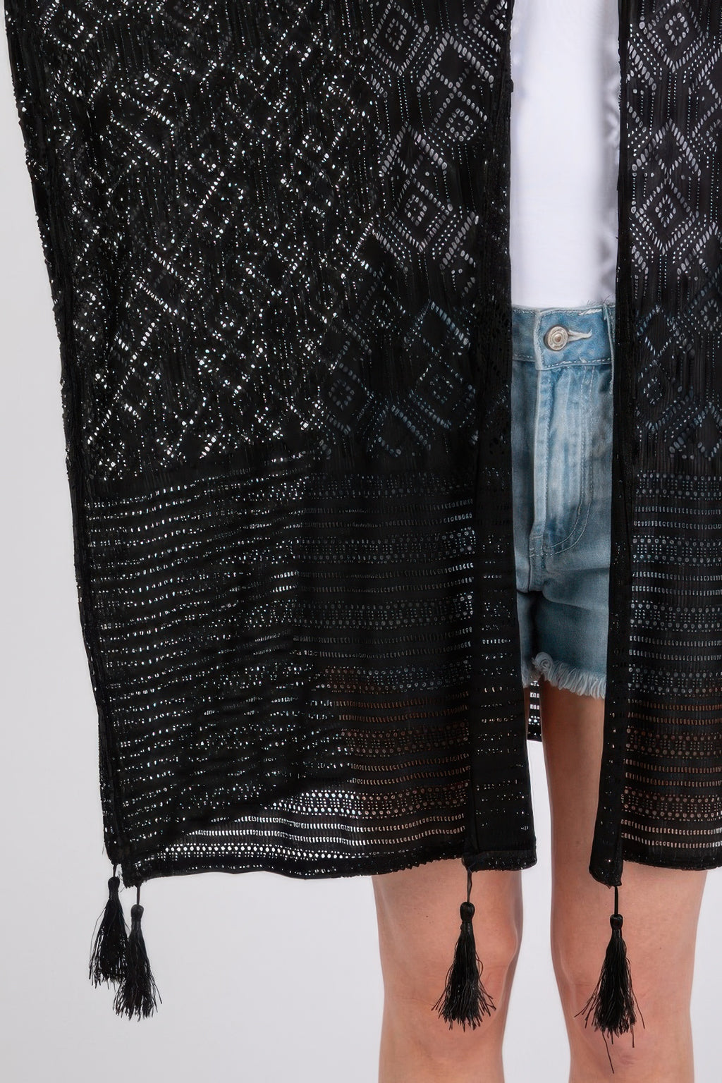 Black geometric tassel cover-up hem with dangling fringe detail