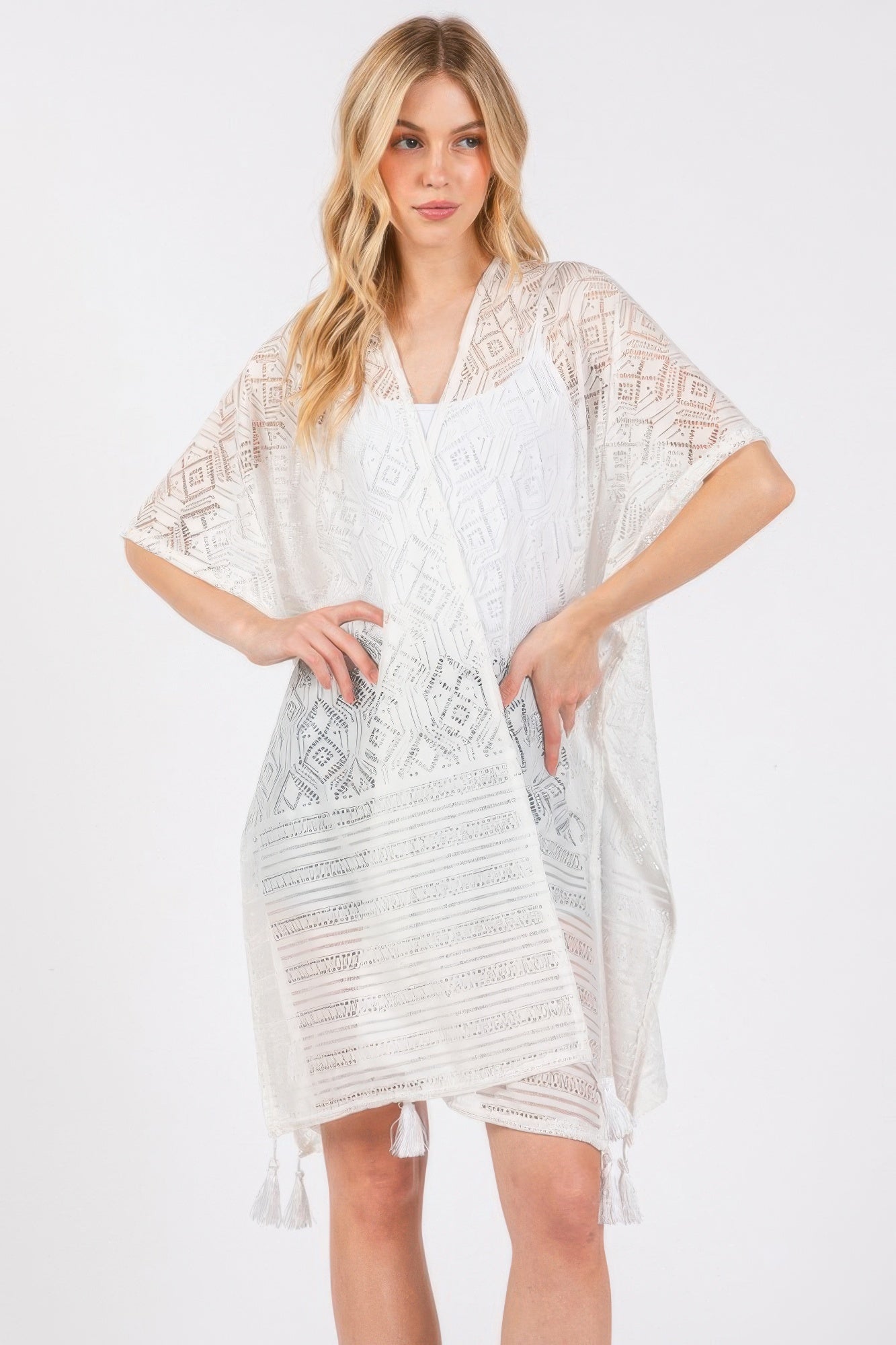 White geometric pattern tassel cover-up with V neckline and fringe