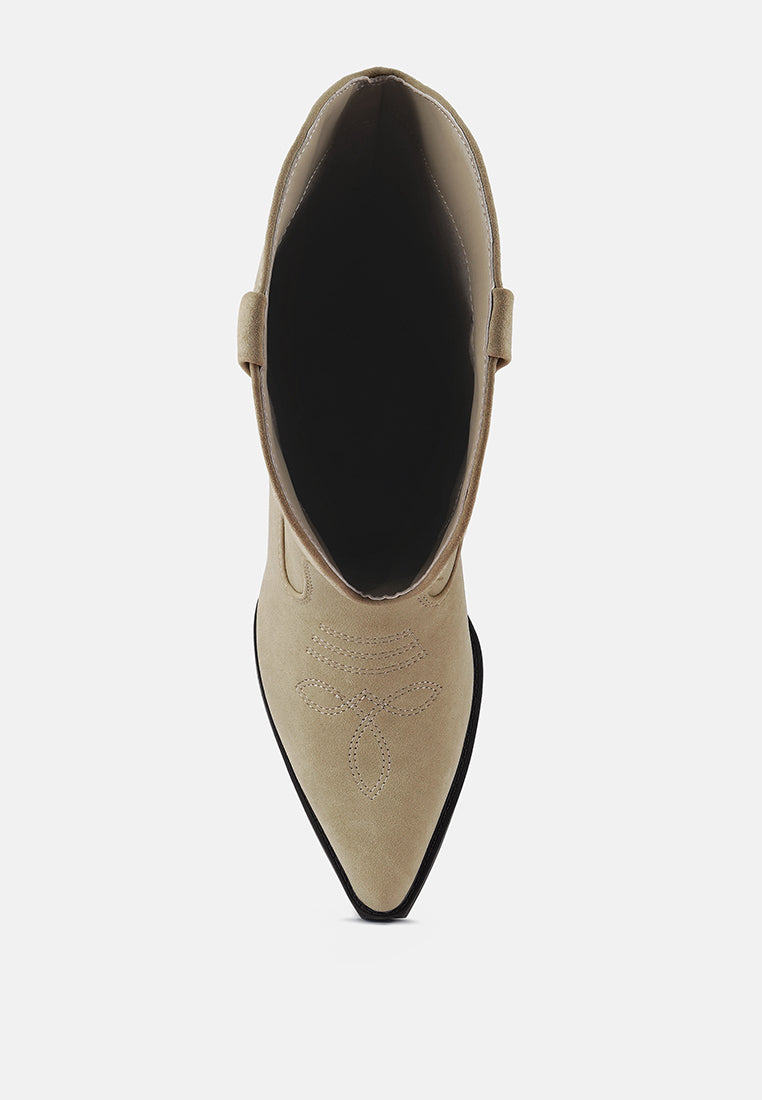 Beige ankle boot with a pointed toe on a white background