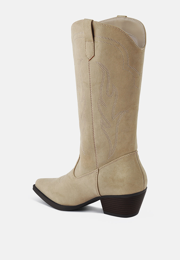 Beige cowboy boot on a white background