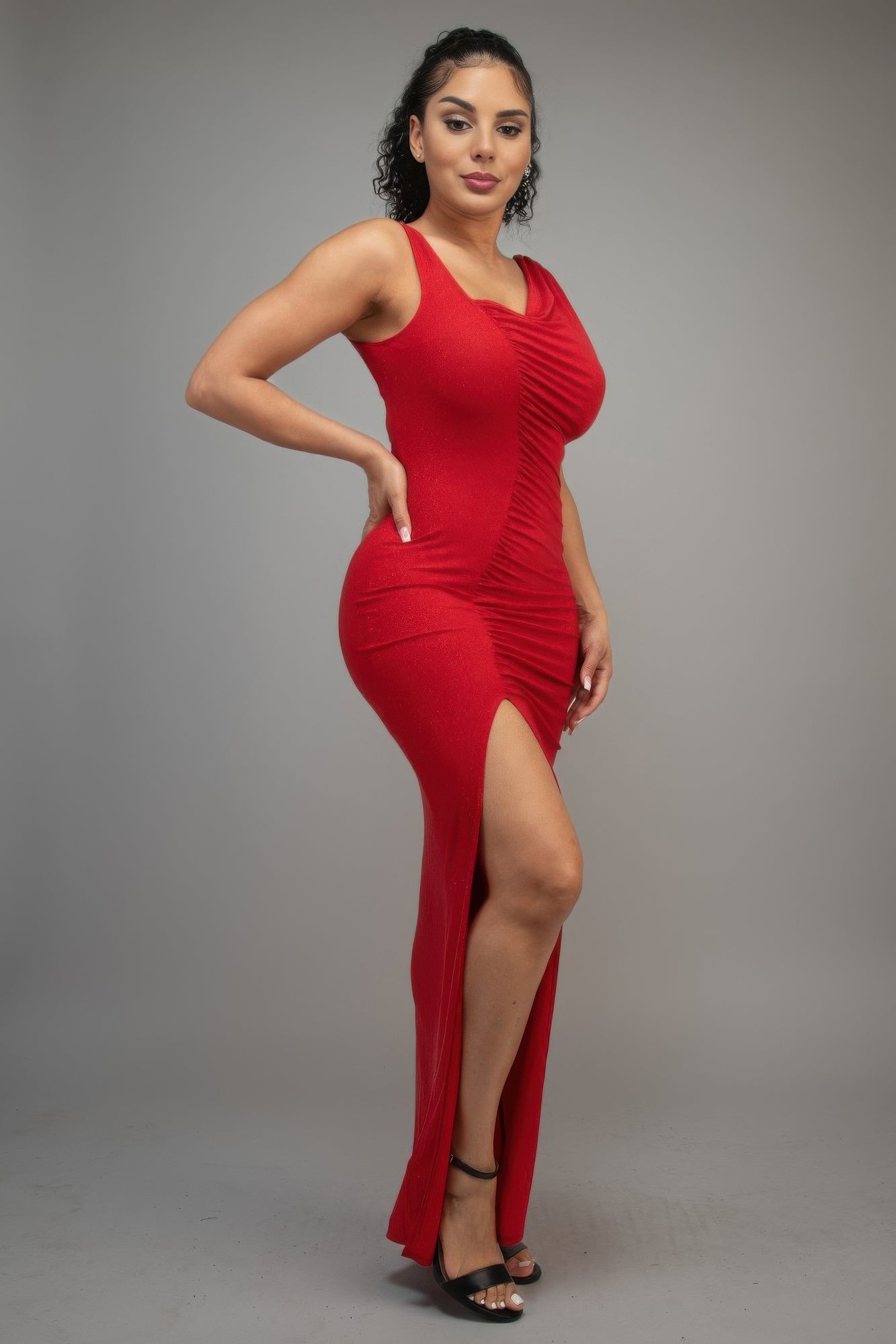 Red glitter slit dress with sleeveless neckline and front leg opening