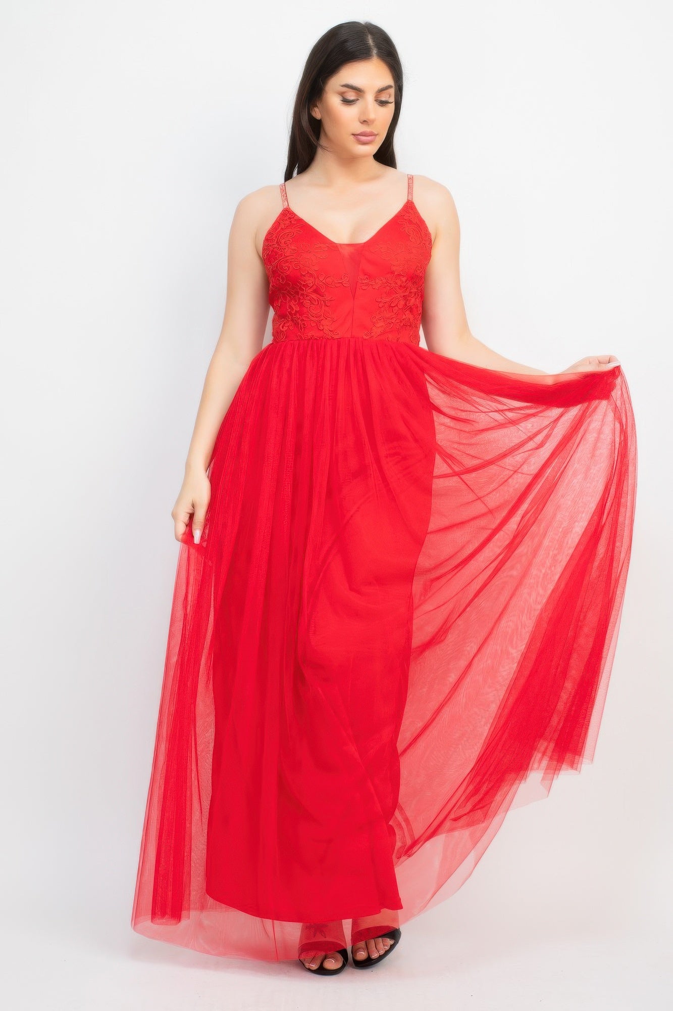 Red mesh maxi dress with glitter straps; draped tulle overlay across skirt