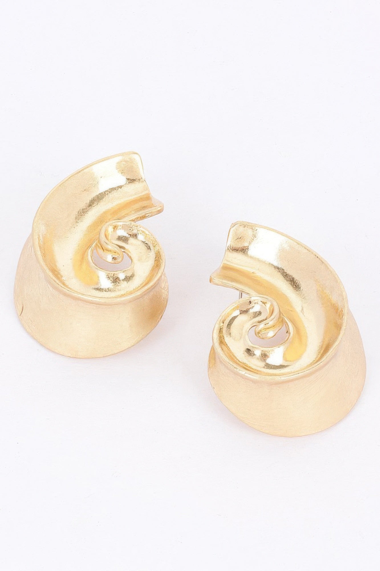 Gold-plated metal earrings, swirl design with half-hoop shape, shiny finish