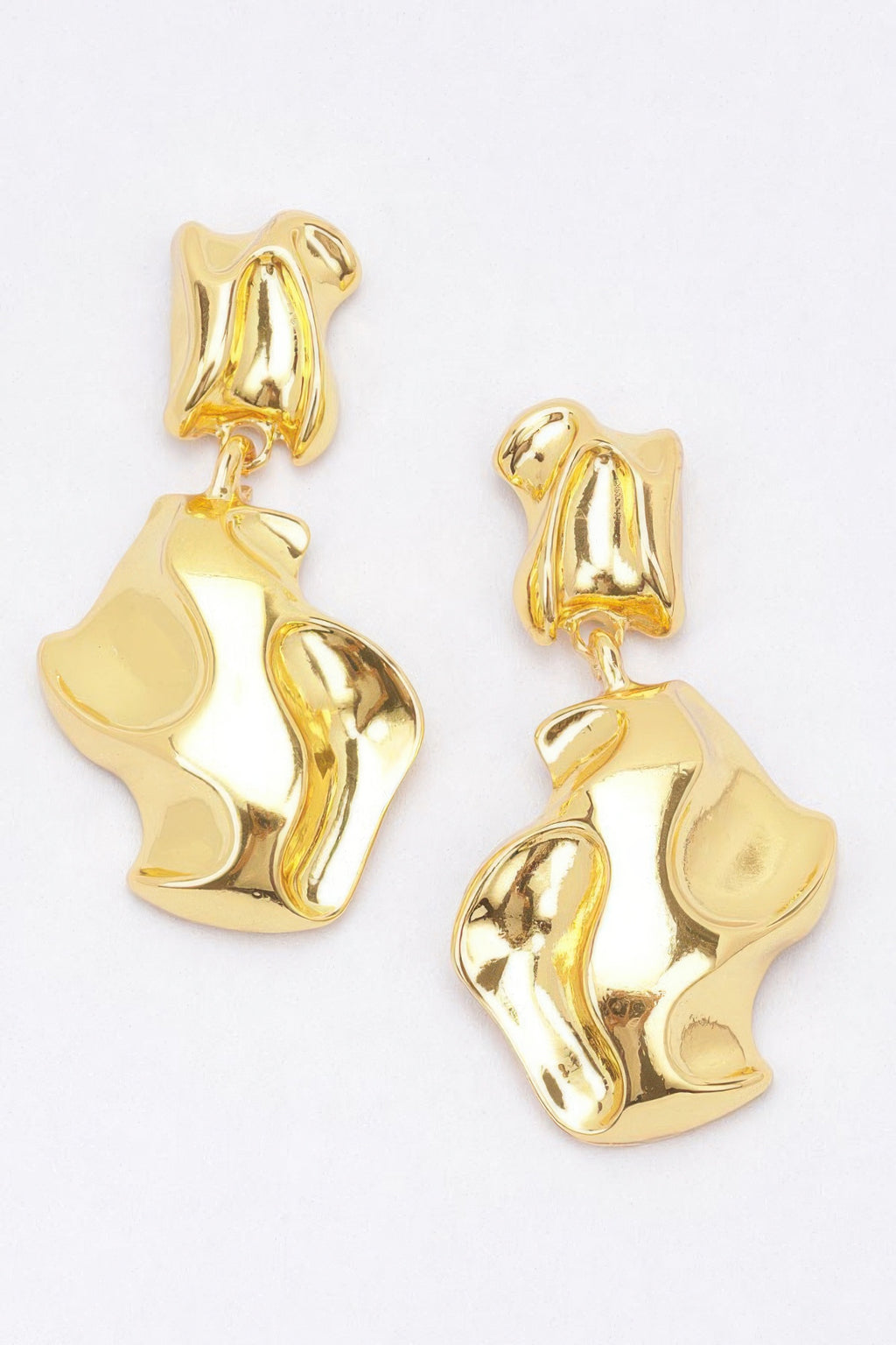 Gold-plated metal earrings, abstract wavy drop shapes with hanging clasp