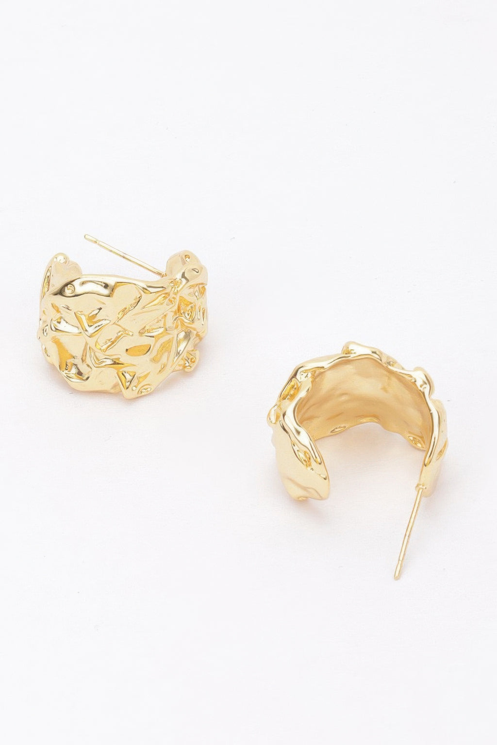 Gold-plated crescent earrings, textured finish; curved post back hardware visible