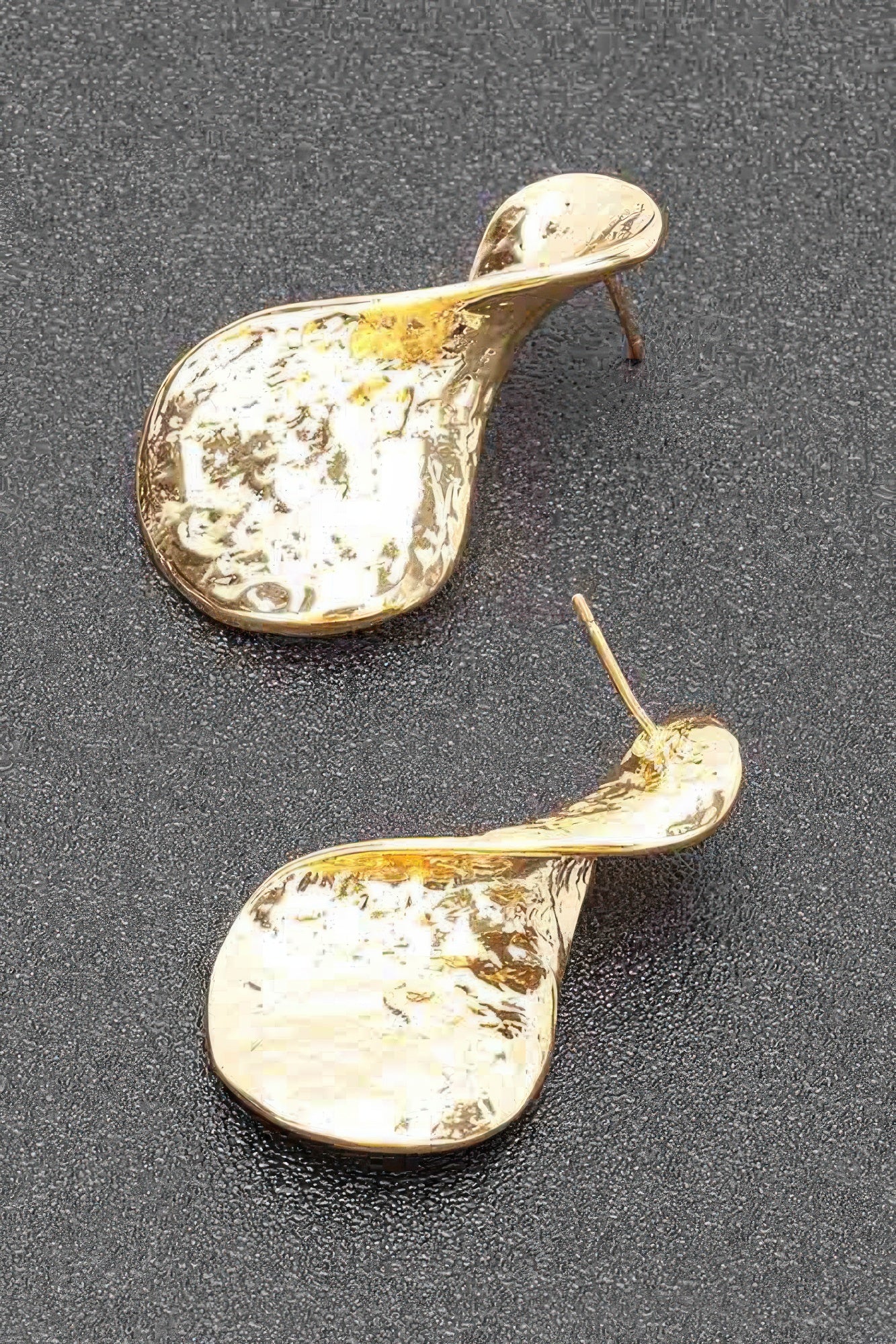 Gold plated curved teardrop earrings with metal post backing and speckled texture
