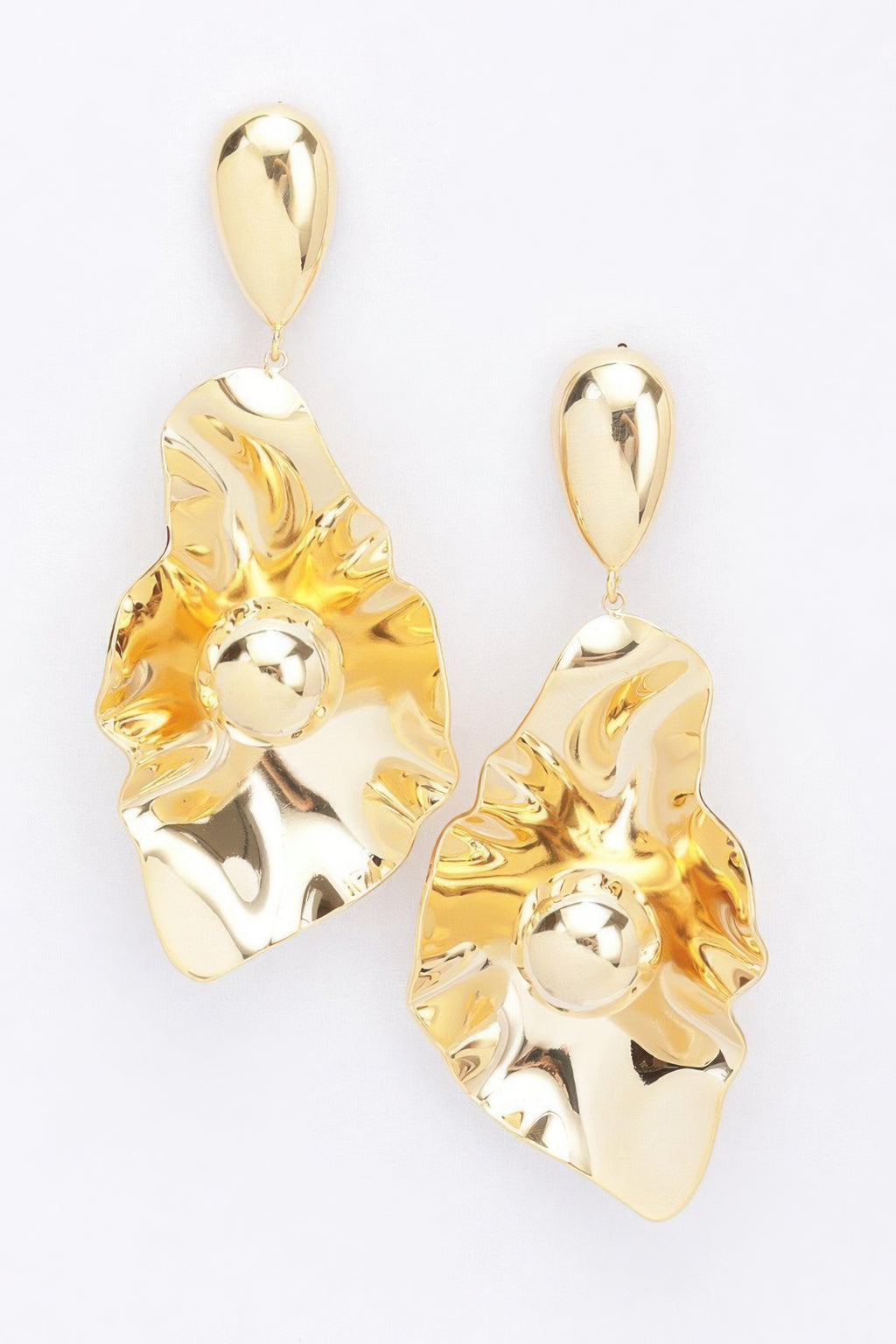 Gold-plated metal earrings with scalloped leaf shape, round center, and teardrop dangle