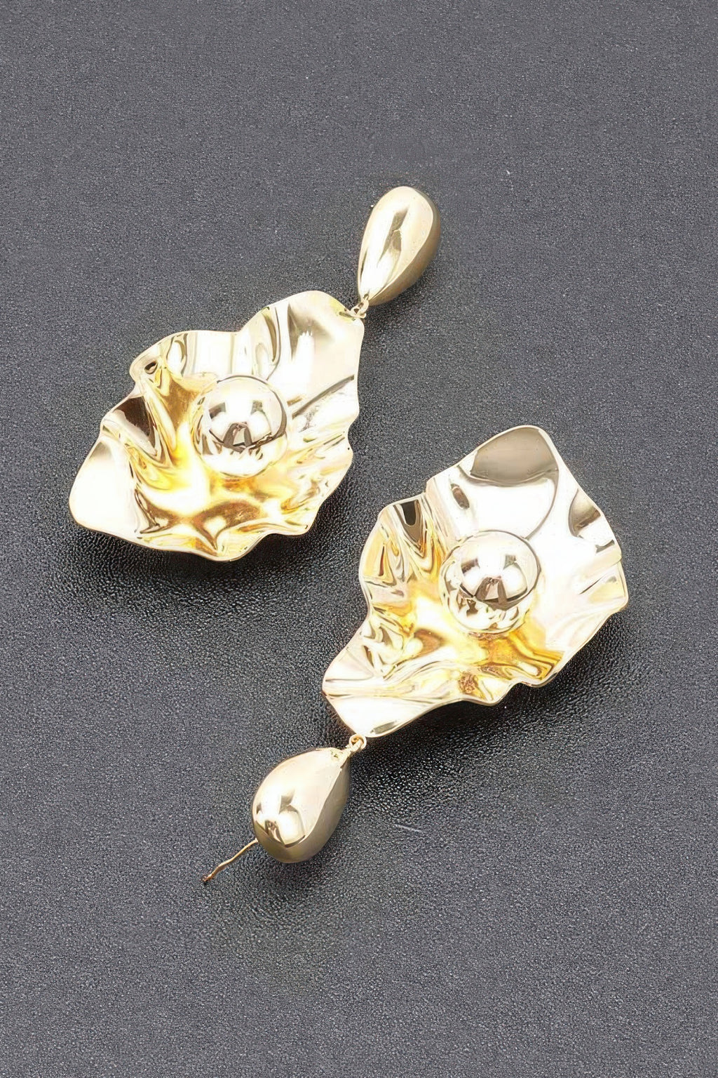 Gold-plated drop earrings: textured leaf studs with round center and hanging oval charm