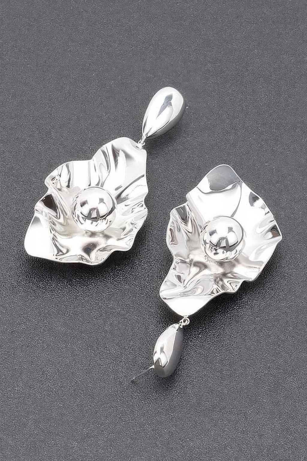 Silver-plated earrings: reflective leaf shapes with round center and dangling oval charm