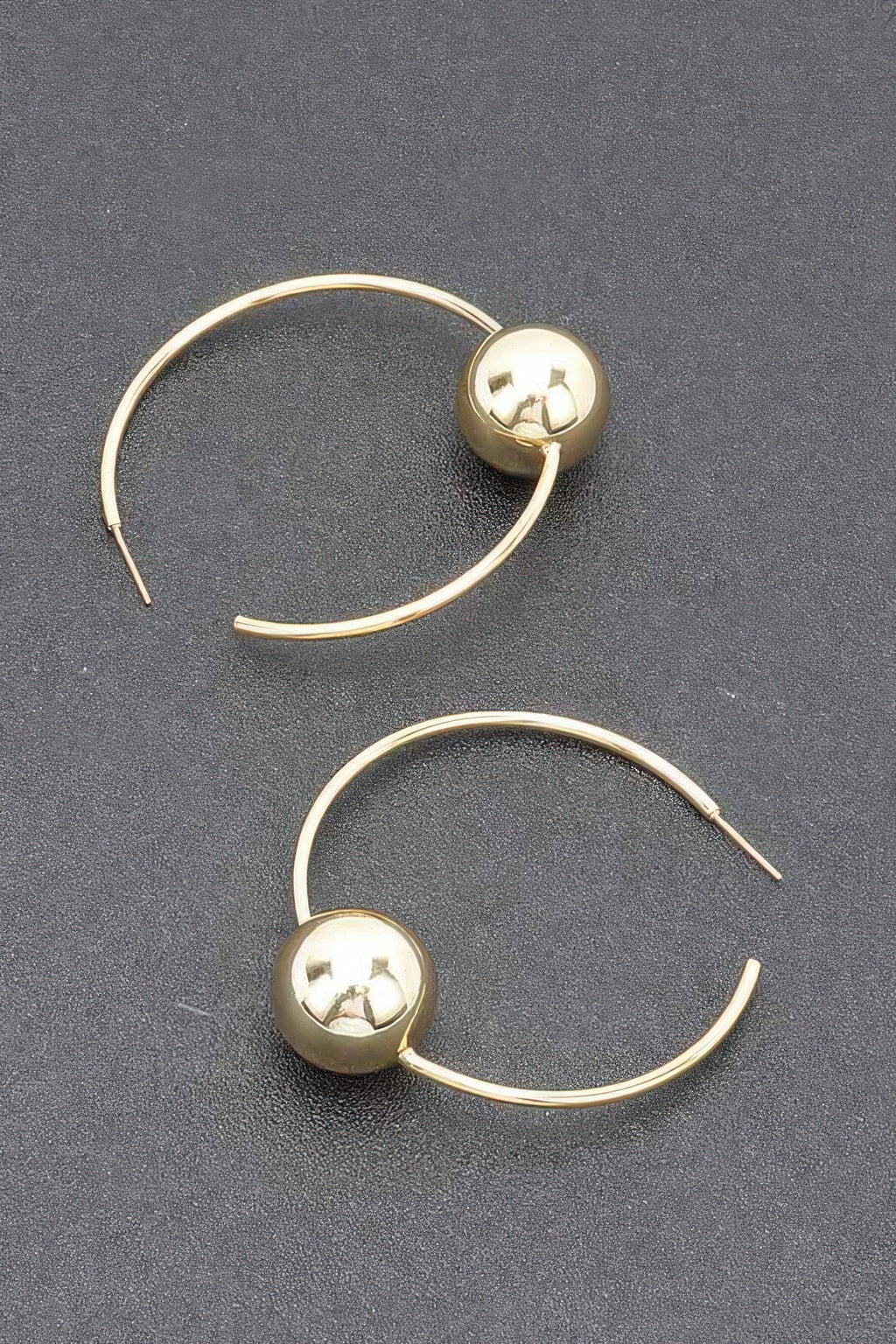 Gold hoop earrings, round ball topper on hinged-style hook, glossy finish
