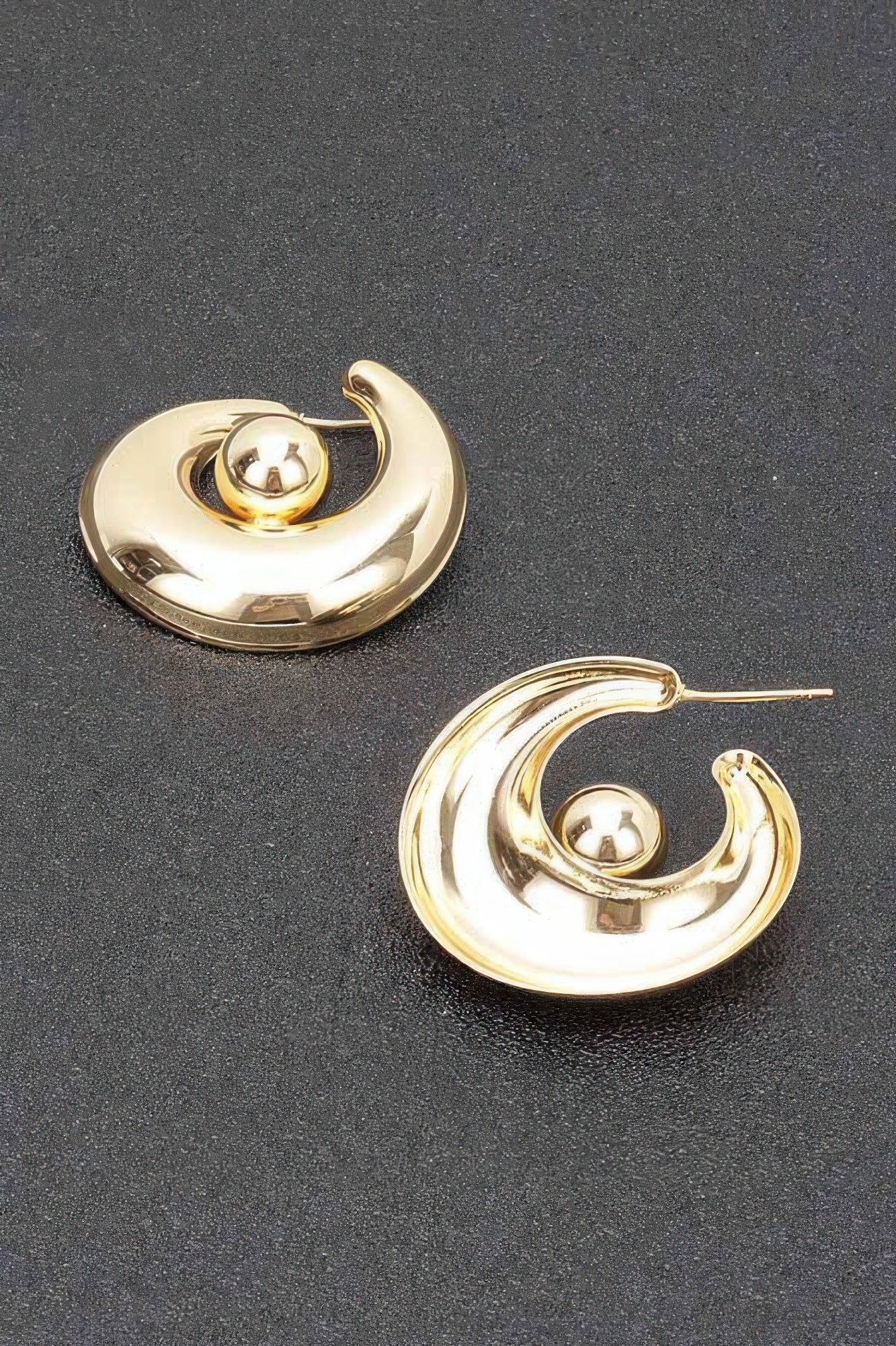 Gold hoop earrings, curved clasp style, ball stud at center