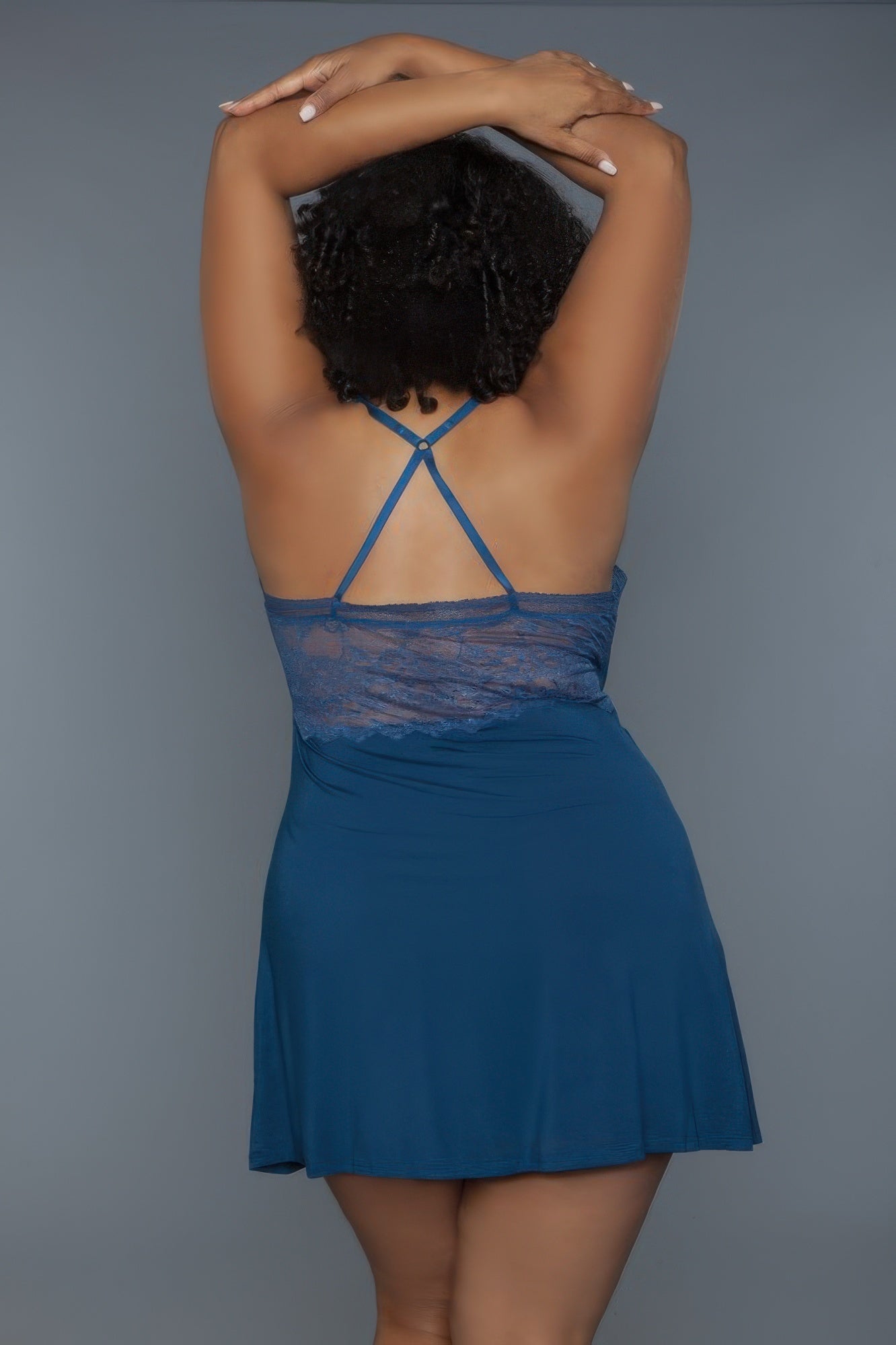 Hailee slip deep blue back view with crisscross straps, lace bodice, flared skirt