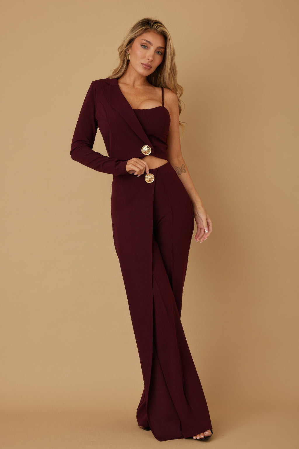 Wine half sleeve two-piece outfit with gold button details and flowing wide-leg pants
