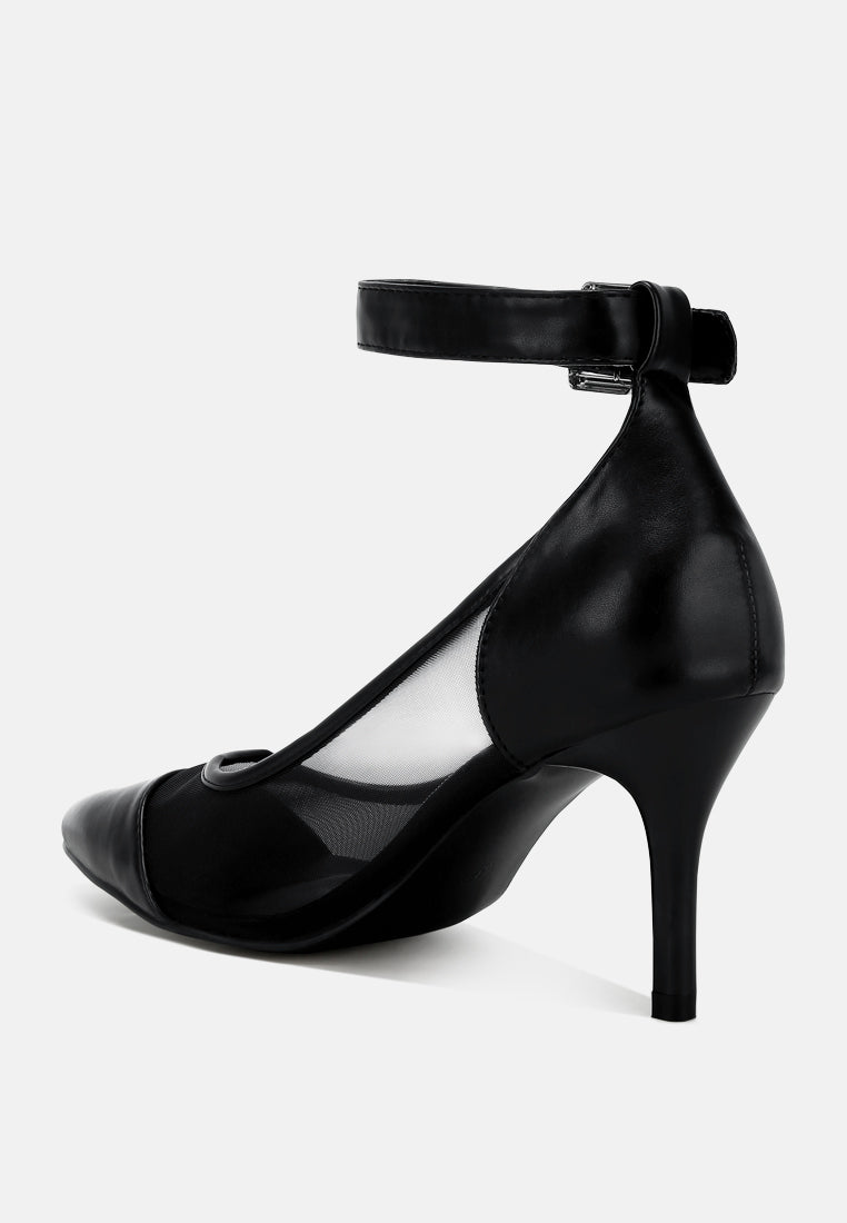 Black pointed toe pump showing ankle strap and high stiletto heel