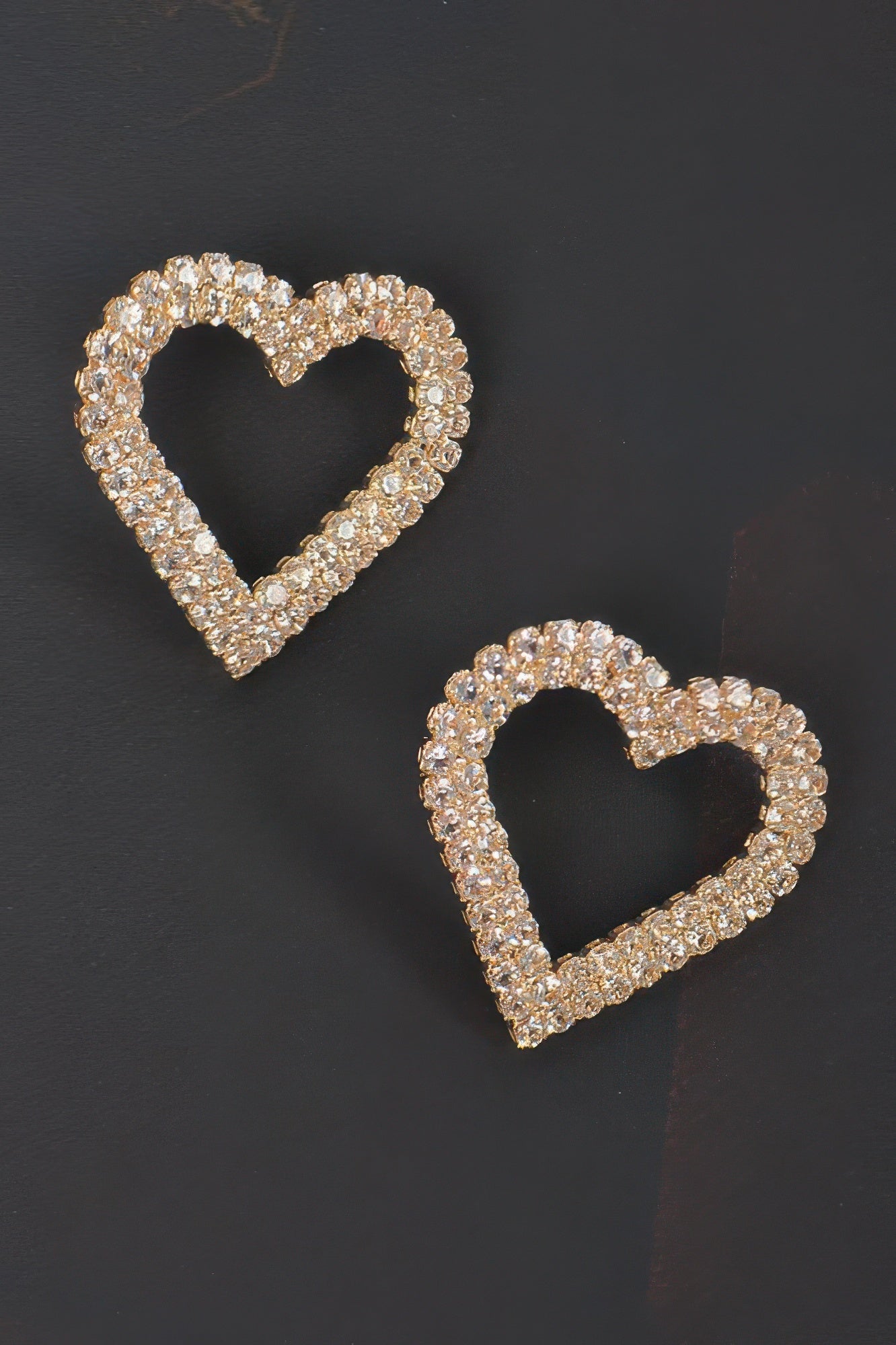 Gold-tone heart rhinestone stud earrings, glittering heart button design
