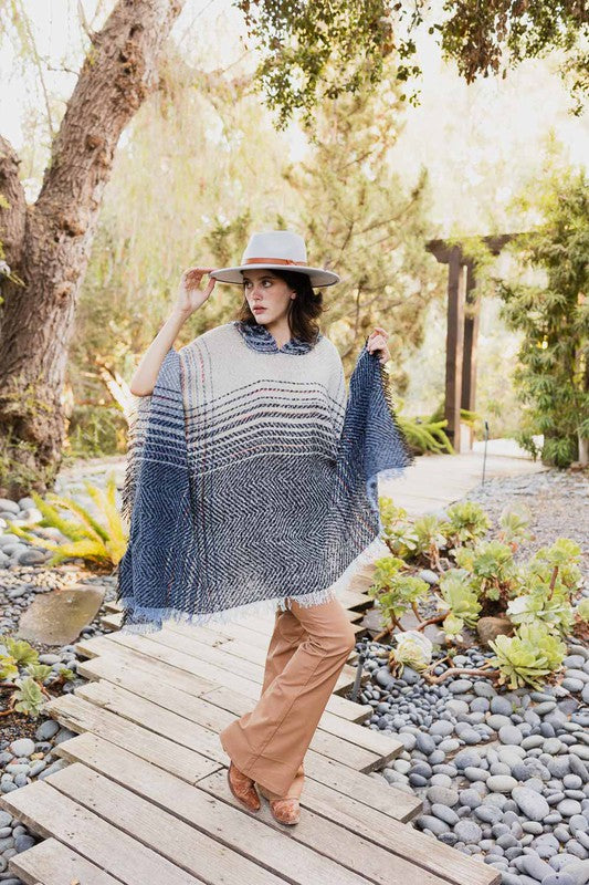 Hooded poncho in herringbone tweed, dark blue and white stripes, frayed hem