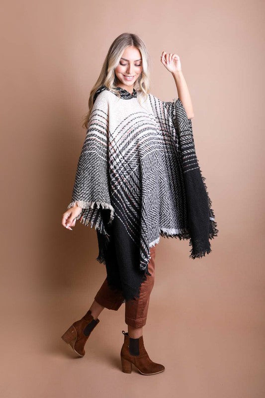 Black and white herringbone tweed hooded poncho with fringed edges