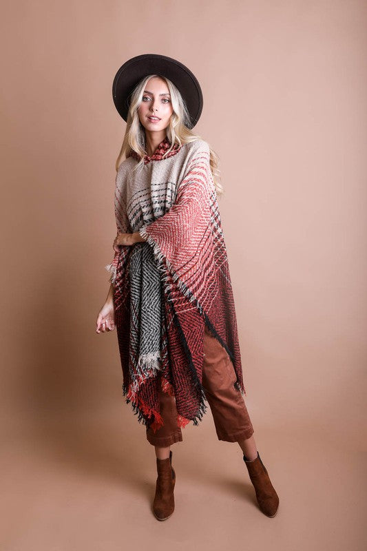 Rust and charcoal herringbone tweed hooded poncho with fringe trim