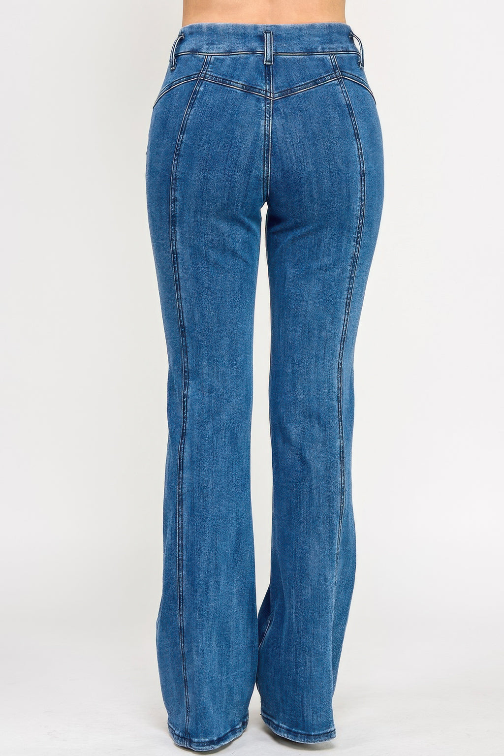 Blue high-rise bell-bottom jeans, back view with center seam and pockets