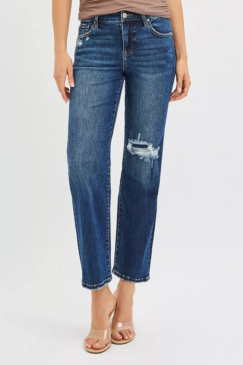Dark blue high-rise crop slim straight jeans; front button, zipper, distressed knee patch