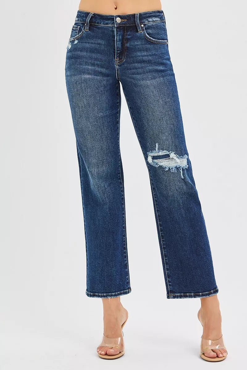Dark blue high-rise crop slim straight jeans; ripped knee patch detail, belt loops