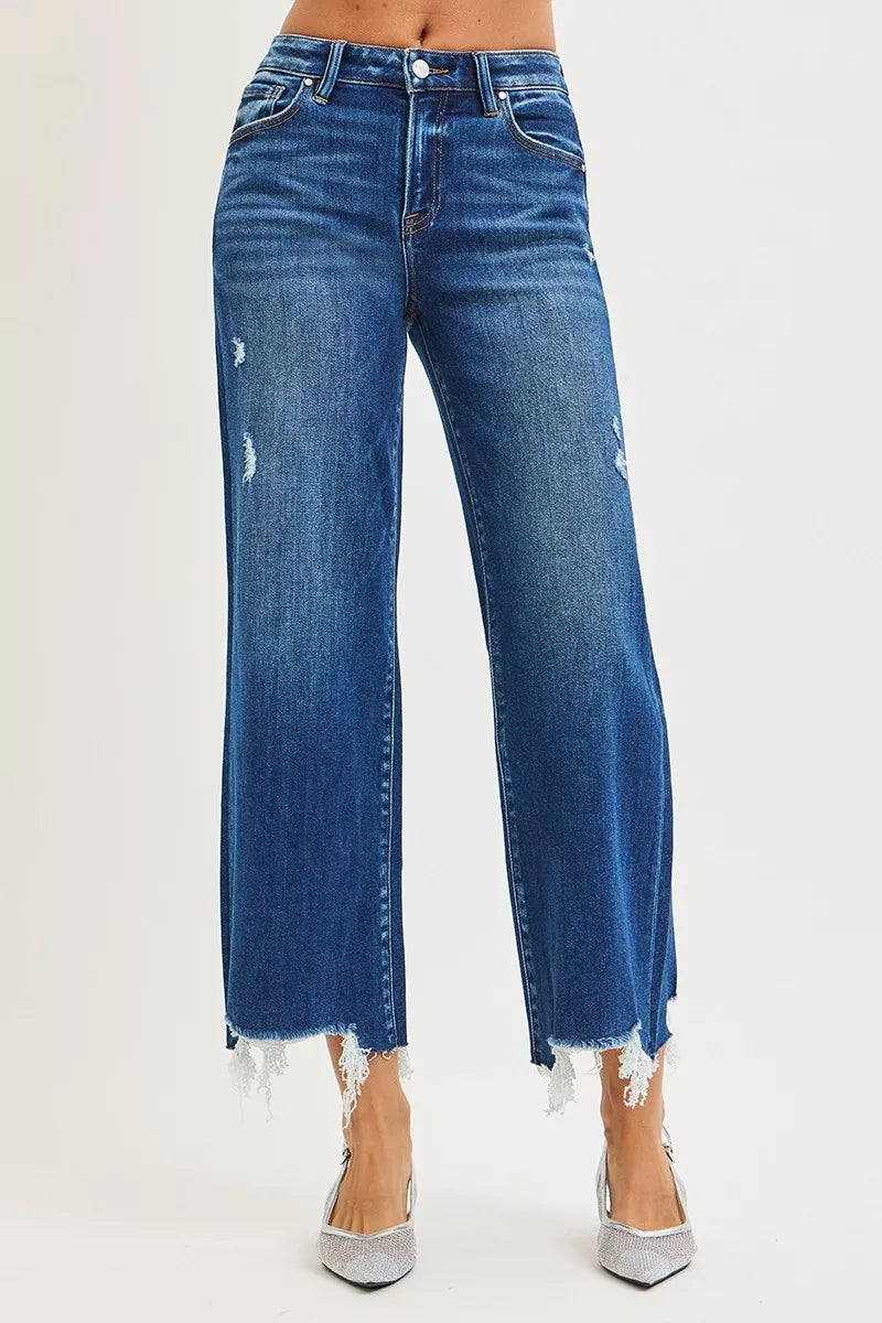 Front view dark blue high-rise wide-leg jeans with ripped details and frayed cuffs