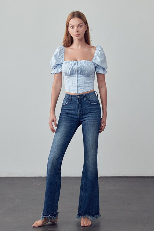 High Rise Skinny Boot Flare Jeans in dark wash, full front view with frayed hem