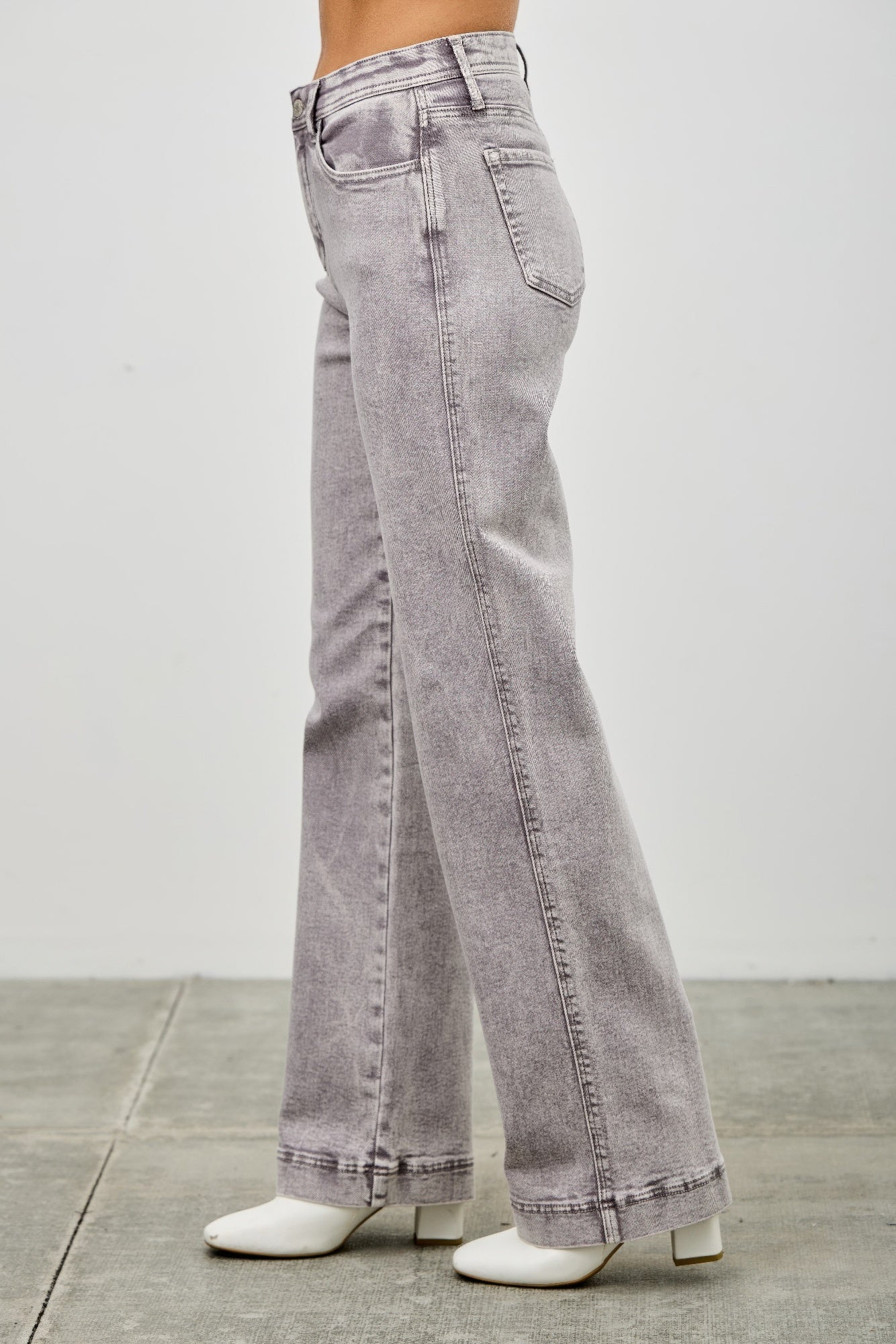 High rise wide-straight jeans in light gray wash, side seams and back pocket detail.