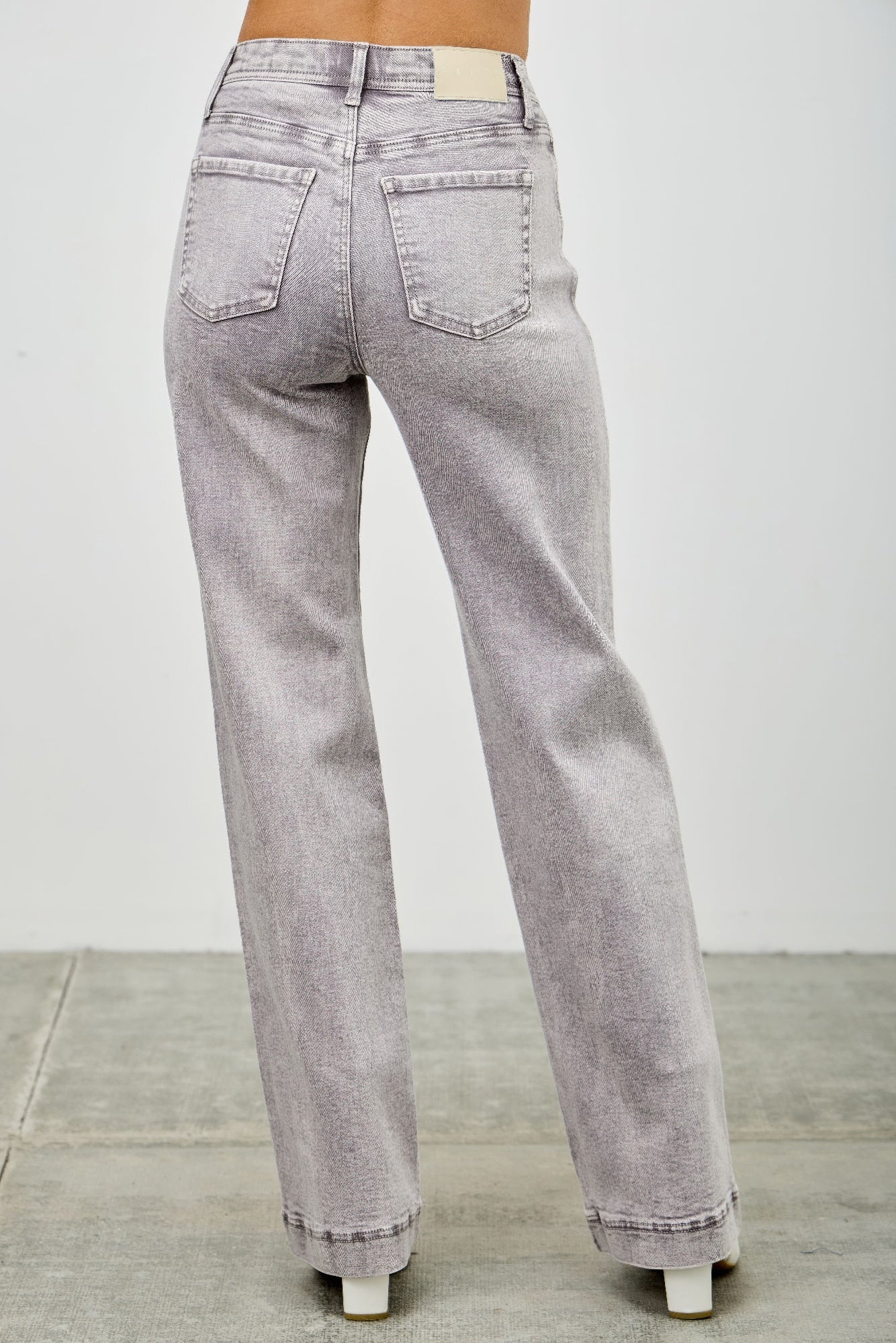 High-rise slim wide straight jeans in light gray denim, full front view