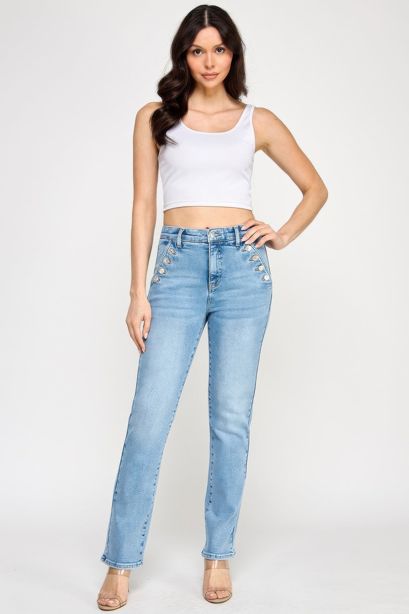 High-rise straight jeans with button pocket detail, light blue wash