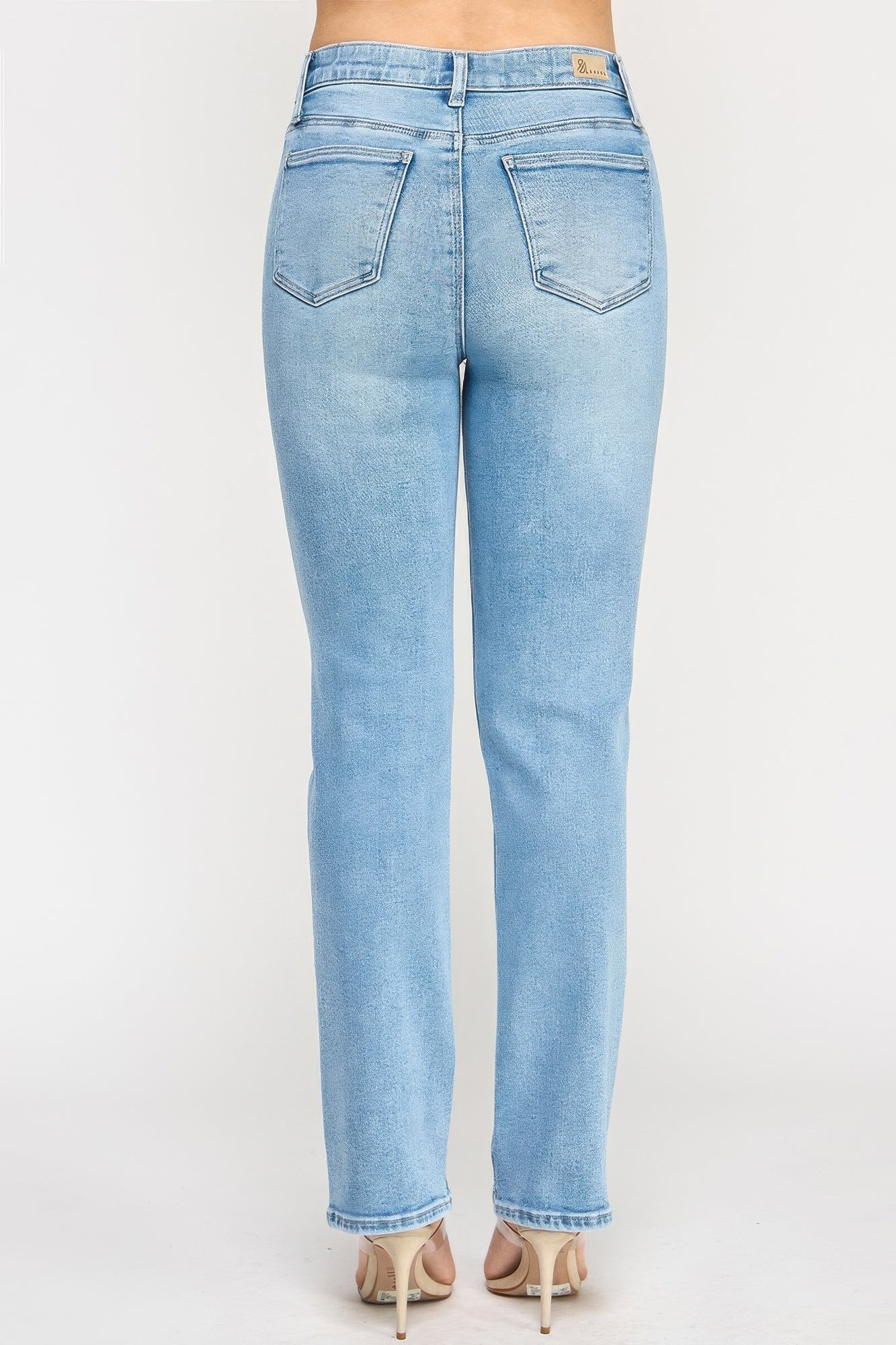High-rise straight jeans with back pockets, light blue denim, rear view