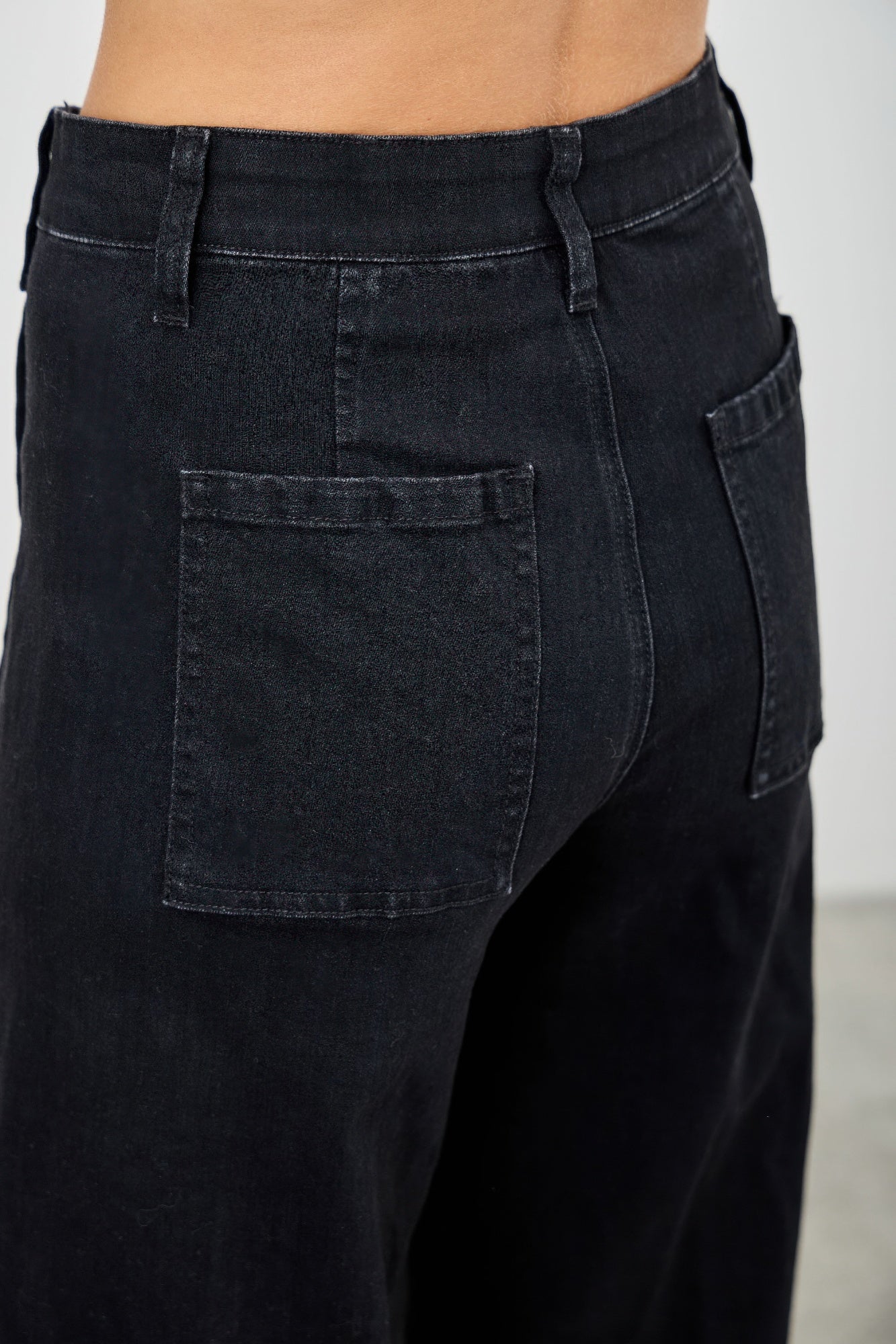 High-rise straight jeans with front seam lines and two front patch pockets